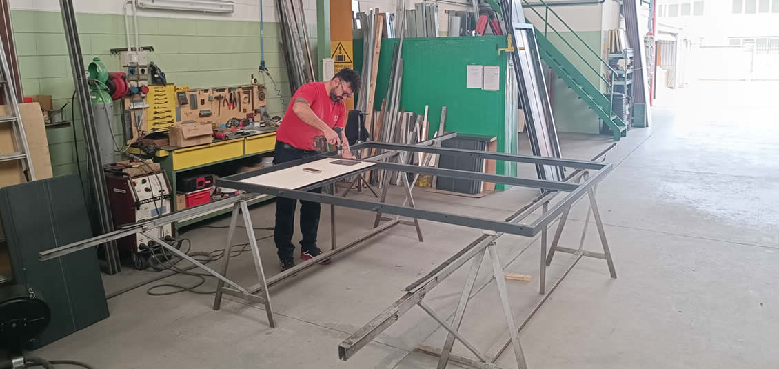 CINF srl: Produzione e Costruzione porte basculanti sezionali a Novara, preventivo, offerta, prezzo